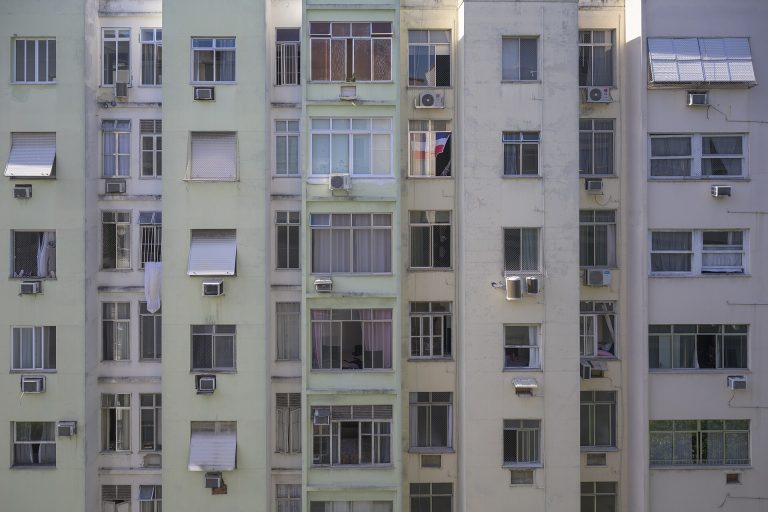 Apartment building facade with window air conditioners in Rio de Janeiro, Brazil