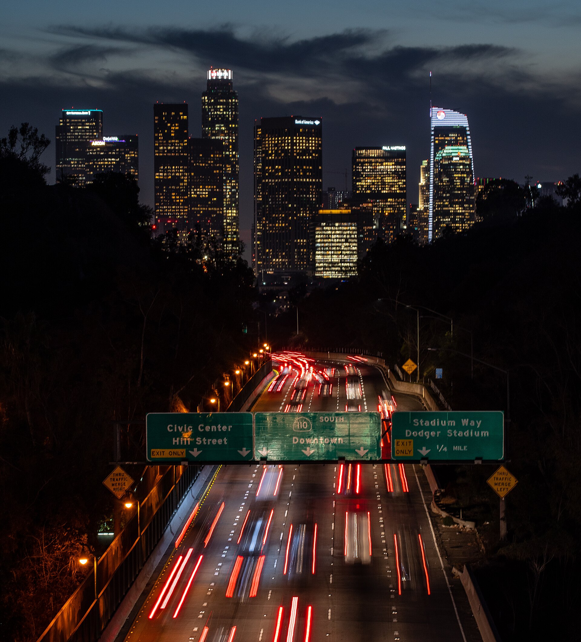 The downtown Los Angeles skyline at night (general view of DTLA; not a photo of Olympic + Hill)