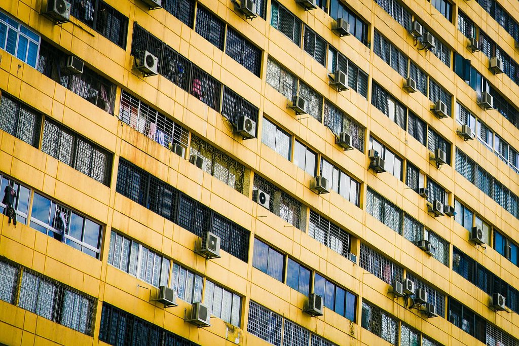 Apartment Building Yellow Wall (Unsplash)