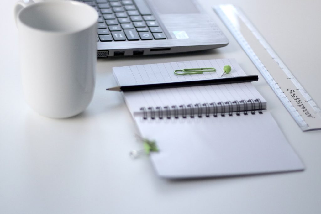 Ruler and laptop on a desk (Unsplash)