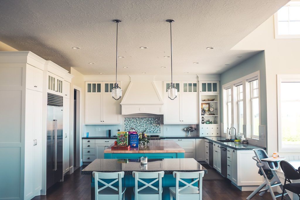 Blue white kitchen interior (Unsplash)