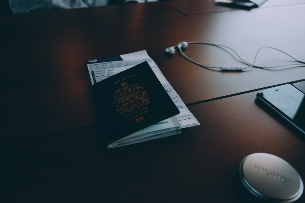 Passport documents desk (Unsplash)
